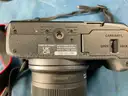 Canon EOS R50 Digital Camera with 2 - Lenses, Powers On: 1 - Canon 18-45 Lens and 1 - Canon 10-18