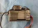 Canon EOS R50 Digital Camera with 2 - Lenses, Powers On: 1 - Canon 18-45 Lens and 1 - Canon 10-18