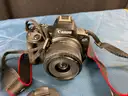 Canon EOS R50 Digital Camera with 2 - Lenses, Powers On: 1 - Canon 18-45 Lens and 1 - Canon 10-18