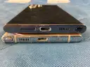 2 - Samsung Cell Phones (User-Locked) Both Power On