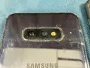 2 - Samsung Cell Phones (User-Locked) Both Power On