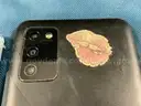 2 - Samsung Cell Phones (User-Locked) Both Power On