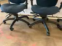 10 - Blue Rolling Office Chairs