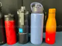 Rubbermaid Action Packer Tote With Lot of Water Bottles