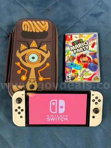 Nintendo OLED Switch Handheld Gaming Console With Case and Super Mario Party Game, Model: HEG-001, Powers On