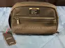 3 - Fashion Wallets/Pouches Labeled as Tumi