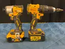 2 - DeWalt Cordless Power Tools with 2 - Batteries and Charger (All Power On)
