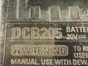 2 - DeWalt Cordless Power Tools with 2 - Batteries and Charger (All Power On)