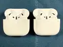 2 - Apple AirPods Gen 4 with Wireless Charging Cases, Model: A3058 (Both Power On)