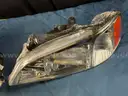 Pair of Eagle Eye HD340-A001R Headlights in Boxes