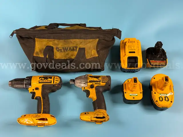 2 - DeWalt Power Tools, 3 - Batteries, 1 - Battery Adapter, and DeWalt Bag