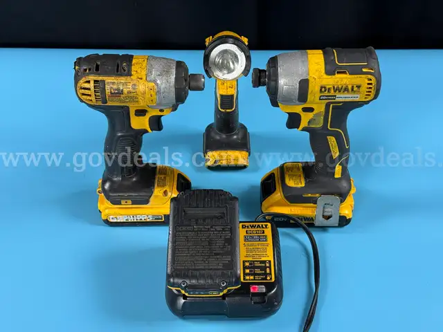 2 - DeWalt Power Tools, 3 - Batteries, 1 - Work Light, and Charger (All Power On)