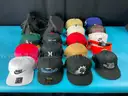 Reebok Duffle with 16 - Fashion Hats Labeled New Era, Otto, Ariat, Nike, Hurley, Mitchell & Ness and Neff
