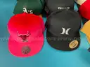 Reebok Duffle with 16 - Fashion Hats Labeled New Era, Otto, Ariat, Nike, Hurley, Mitchell & Ness and Neff