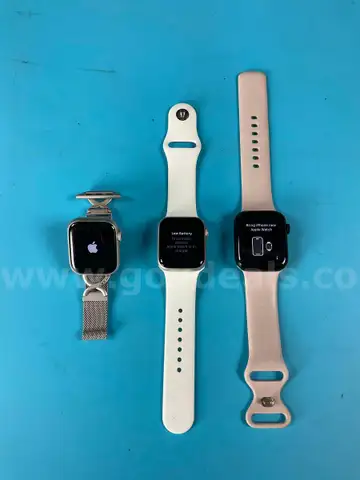 3 - Apple Watches (Unlocked) with Bands, All Power On (Scratched Screens)