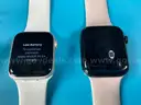 3 - Apple Watches (Unlocked) with Bands, All Power On (Scratched Screens)