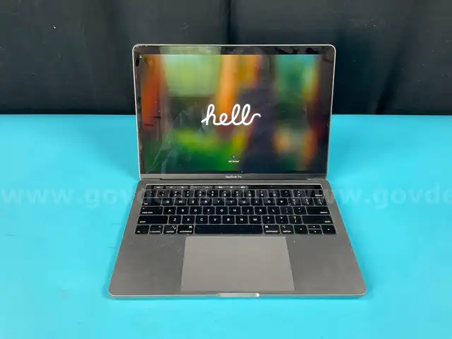 Apple MacBook Pro Model A1989, Powers On (Bent Case)