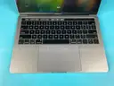 Apple MacBook Pro Model A1989, Powers On (Bent Case)