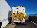 2014 Peterbilt 320 Side Loading Trash Truck (CNG)