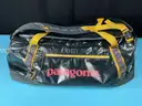 Fashion Duffel Bag Labeled Patagonia 55L Black Hole Duffel