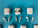 10 - Apple AirPods 1 with Lightning Charging Cases Model A1602, All Power On