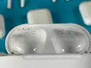 10 - Apple AirPods 1 with Lightning Charging Cases Model A1602, All Power On