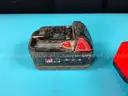 3 - Milwaukee RedLithium Battery Packs and 1 - Charger, All Power On and Charge