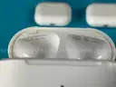 12 - Misc. EMPTY Apple AirPods and AirPods Pro Charging Cases, All Power On
