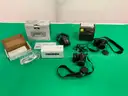 Lot of Nikon Cameras and Rollo Printer, All Power On