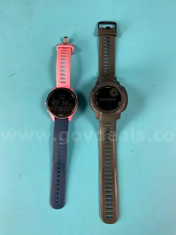 2 - Garmin Smart Watches (Unlocked) Both Power On: 1 - Forerunner 255S and 1 - Instinct 2