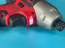 2 - Milwaukee Cordless 1/4" Hex Impact Drivers with Batteries, Both Power On