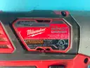 2 - Milwaukee Cordless 1/4" Hex Impact Drivers with Batteries, Both Power On