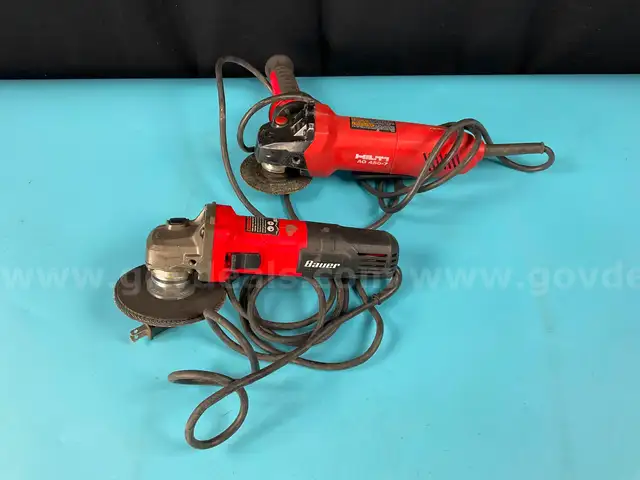 2 - Corded Angle Grinders, Both Power On: 1 - Bauer Model 1865E-B and 1 - Hilti Model AG 450-7
