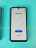 2 - Samsung Cell Phones (User Locked) Both Power On