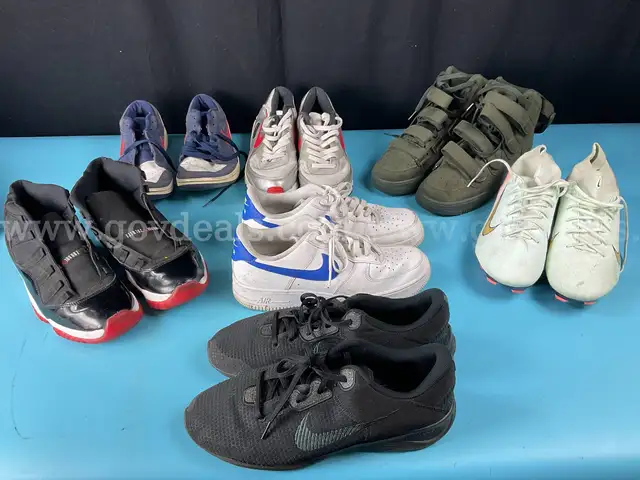 Nike Duffel with 7 - Pairs of Nike Shoes and Cleats