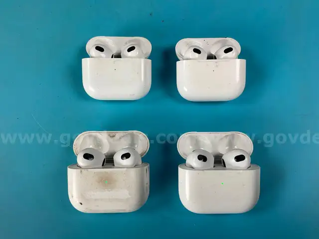 4 - Apple AirPods 3 with Lightning Charging Cases Model A2897, Both Power On (1 - Scratched)