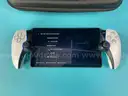 Sony PlayStation Portable Remote Player, Model CFI-Y1001 with Case and Accessories, Powers On