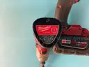 2 - Milwaukee Cordless 1/4" Impact Drivers with Batteries, Both Power On