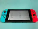 Nintendo Switch Portable Gaming Console, Model HAC-001(-01) With Case
