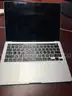 Approximately 20 MacBook Pros