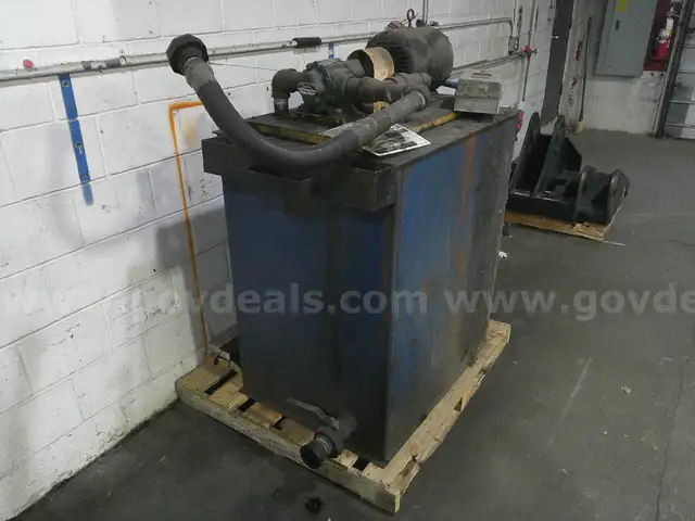 Rotary lift hydraulic tank, pump and motor