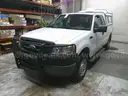 2007 Ford F-150 Extended Cab 4X4 With Topper and Push Bumper