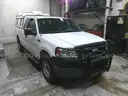 2007 Ford F-150 Extended Cab 4X4 With Topper and Push Bumper