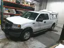 2007 Ford F-150 Extended Cab 4X4 With Topper and Push Bumper