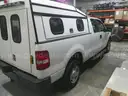 2007 Ford F-150 Extended Cab 4X4 With Topper and Push Bumper