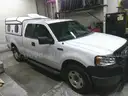 2007 Ford F-150 Extended Cab 4X4 With Topper and Push Bumper
