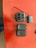 Lot of motorola pagers/ chargers, one Ht1250 radio