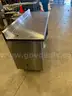Refrigerators, drink cooler, chairs, safe, coffee maker, stainless steel tables, frozen drink machine.