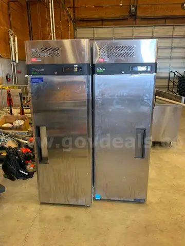 Refrigerators, drink cooler, chairs, safe, coffee maker, stainless steel tables, frozen drink machine.