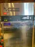 Refrigerators, drink cooler, chairs, safe, coffee maker, stainless steel tables, frozen drink machine.